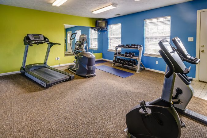 Community fitness center with several machines and free weights