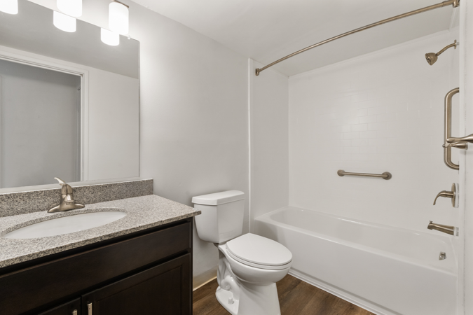 Bathroom with black cabinets