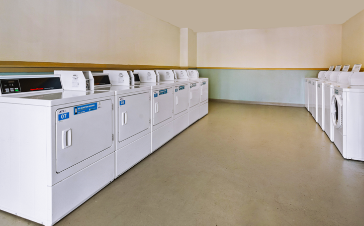 Laundry room with washers and dryers