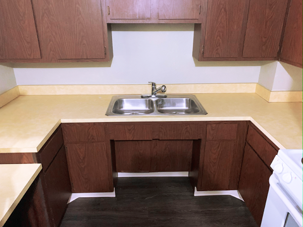 Kitchen with brown cabinets
